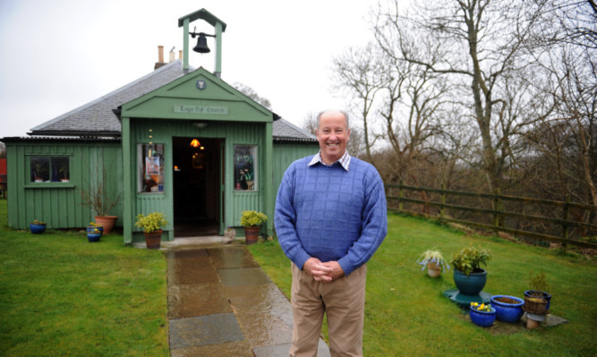 Joe Wishart leaves the 'mud hut' at the end of his tenancy.