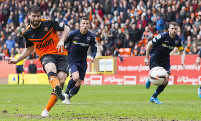 Nadir Ciftci scoring from the penalty spot.