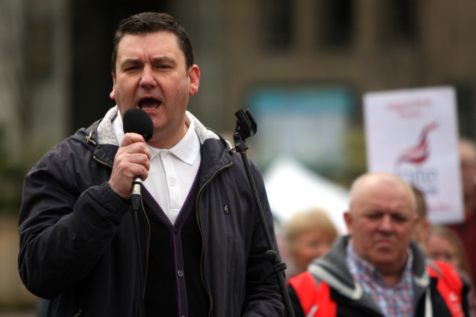 Workers and union members from across the country gathered in Dundee for a rally in support of striking hospital staff. Jim McFarlane speaking.
