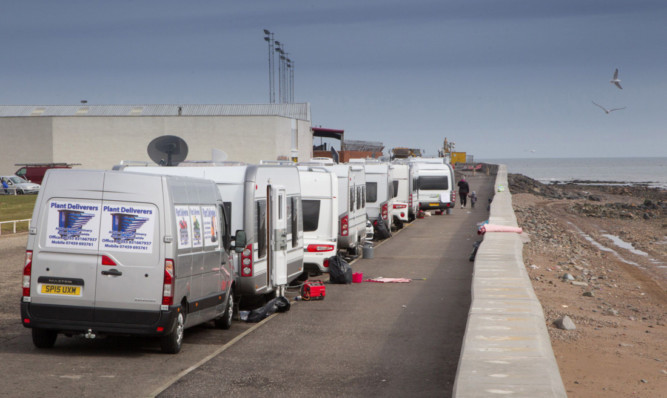 Travellers parked their caravans at the seafront at Arbroath at the start of the Easter holiday weekend.