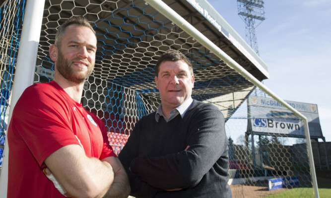 Alan Mannus and Tommy Wright.