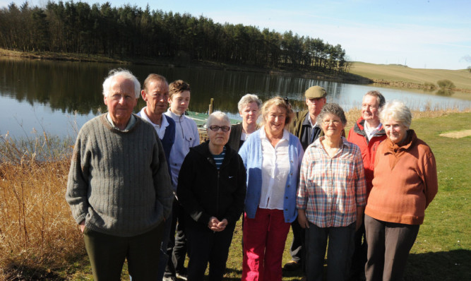 Graham Lang, left, with fellow campaigners who say the proposed turbine will affect wildlife.