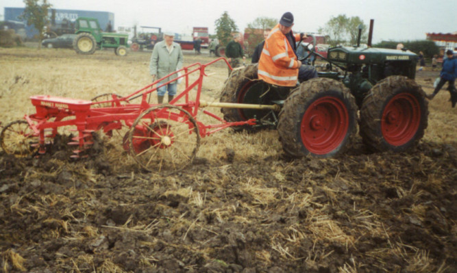 A rubber-tired example with an MH Pulverator plough at a working event in Lincolnshire.