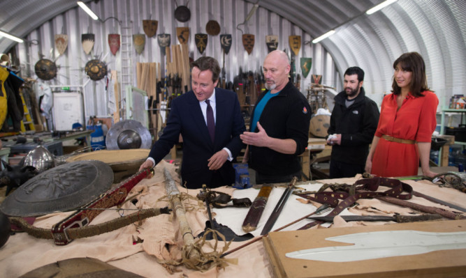 Prime Minister David Cameron and his wife Samantha visit the Titanic Studios in Belfast, where they saw the film set for the TV drama Game of Thrones.