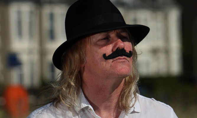'Tache man  Danny McAfee on Broughty Ferry Beach after he stole the show at the Scottish Leaders Debate wearing a fake moustache.
