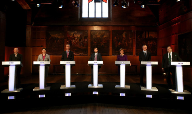 From left: Scottish Green Party Leader Patrick Harvie, Scottish Conservative Leader Ruth Davidson MSP, Scottish Labour leader Jim Murphy, BBC Host James Cook, First Minister and SNP leader Nicola Sturgeon, Scottish Liberal Democrat leader Willie Rennie MSP and UKIP MEP David Coburn.