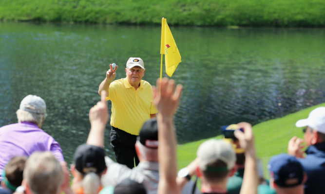 Jack Nicklaus celebrates his hole-in-one on the fourth hole.