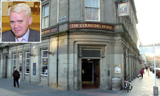 Former Dundee West MP Jim McGovern (inset) is acused of being disrespectful to staff in the Wetherspoons pub.