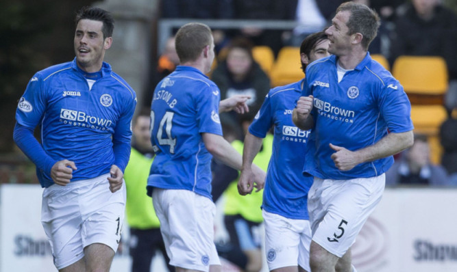 Saints celebrate the winning goal.