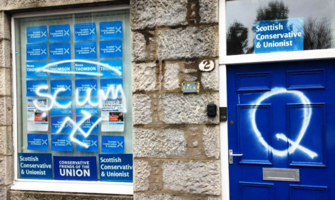 The Conservative and Unionist Association office in West Mount Street, Aberdeen which was vandalised with the word "scum", a swastika and the letter "Q" in white spray paint.