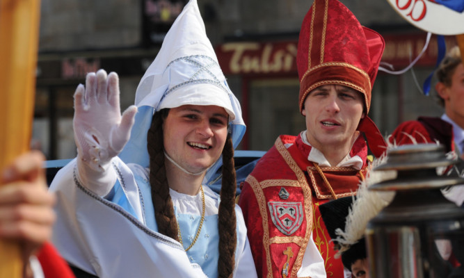 11.04.15 - pictured at the 89th Annual Kate Kennedy Procession held in St Andrews - some of the Dramatis Personae who took part in the procession - l to r - Kate Kennedy and Bishop James Kennedy