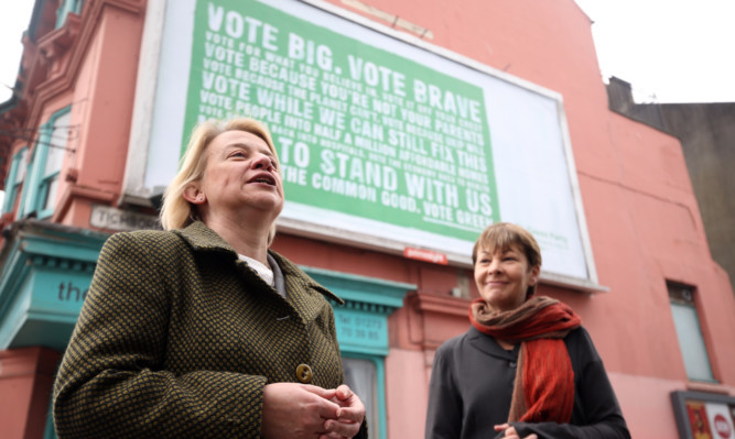 Green Party leader Natalie Bennett (left) with Brighton Pavilion parliamentary candidate Caroline Lucas during the launch of the Green Party billboard campaign in Brighton.