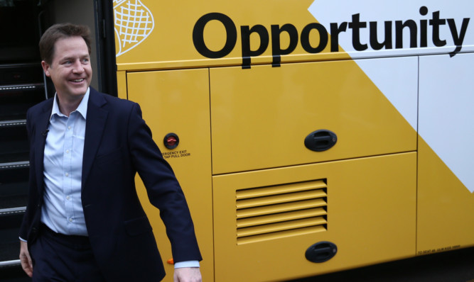 Liberal Democrat leader Nick Clegg arrives to meet with apprentices and local employers during a visit to Mid- Kent College in Maidstone.