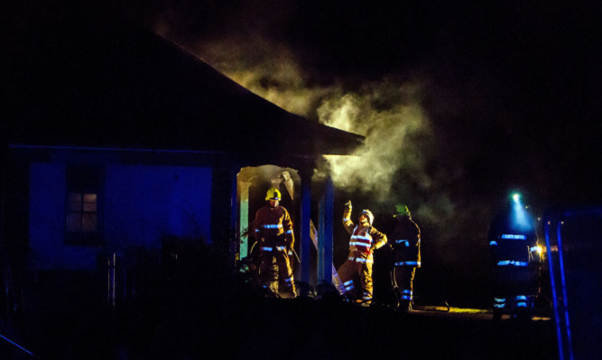 Fire crews at the scene of last week's malicious blaze at Baxter Park's bowling pavilion.