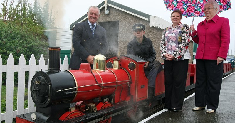 Kim Cessford, Courier - 10.07.10 - Kerr's Miniature Railway in Arbroath celebrates it's 75th anniversary - pictured at the start of the celebrations with the steam engine 'Firefly' are l to r - Steve Nicoll (Chairman of the Royal British Legion (Scotland) Arbroath Branch whio are also celebrating their 75th anniversary), John Kerr, Helen Nicoll and Janette Millar who celebrated her 75th birthday this year