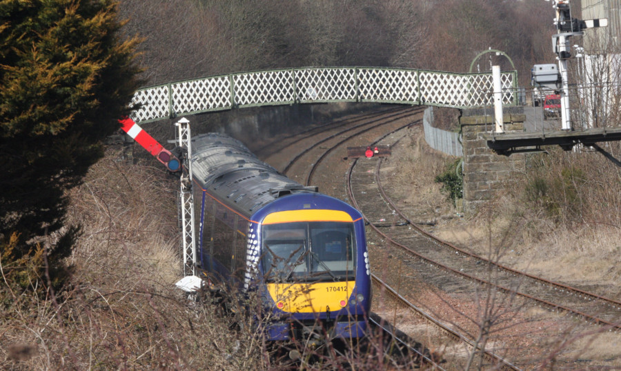 The vacuum cleaner was suspended from the footbridge near Dens Road.