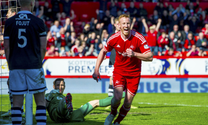 Aberdeen's Adam Rooney celebrates after putting his side 1-0 up.