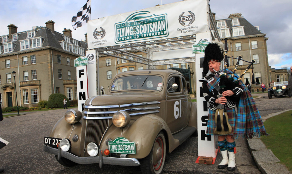 The cars are given a traditional welcome to the Gleneagles Hotel.