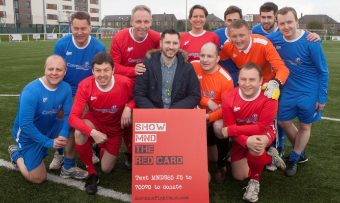 Labour and Conservative teams with MND campaigner Gordon Aikman.