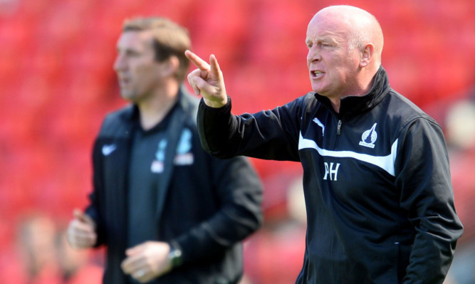 Peter Houston leading his team to victory over Hibs in the semi-final.