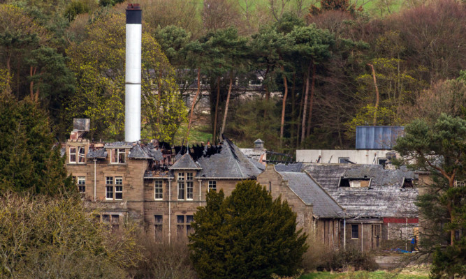 The already dilapidated building suffered serious roof damage in the blaze.