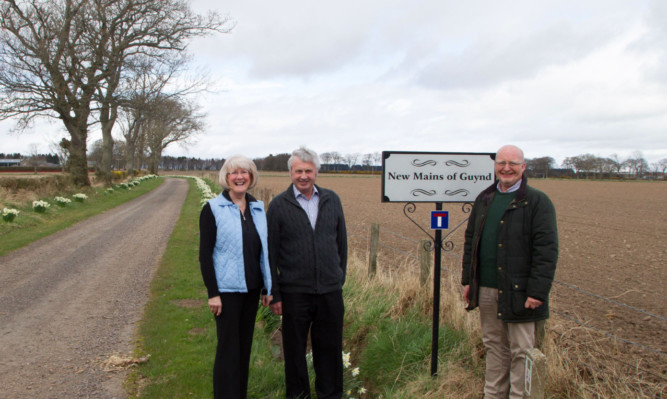 BWE Partnership owner Ron Shanks with Robert and Brenda Jackson who farm at New Mains of Guynd.
