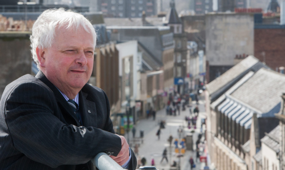 Council leader Ian Miller, looking out on to Perth High Street, has a vision for the city.