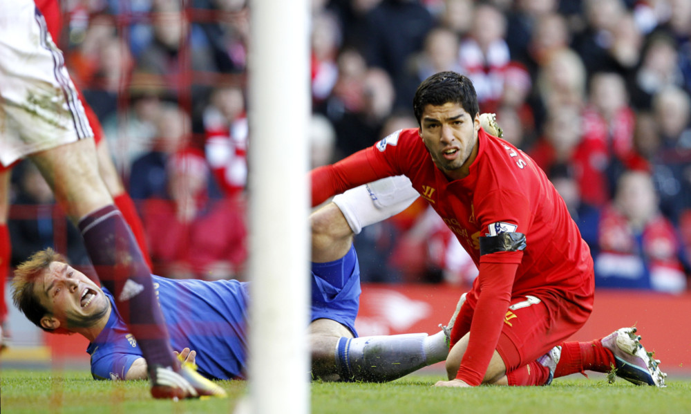 Liverpool's Luis Suarez (right) and Chelsea's Branislav Ivanovic (left).