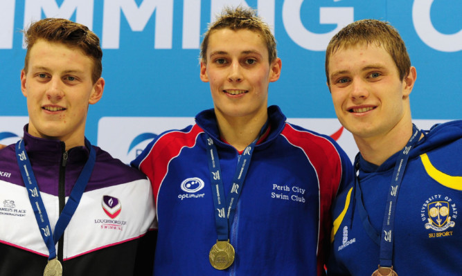 Stephen Mline (centre) with his British gold medal.