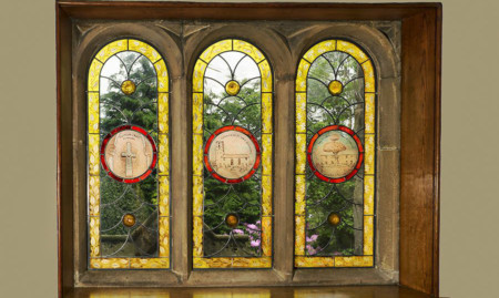 The beautiful stained glass windows which now grace Glebe House 150 years from the rest of the house being built.
