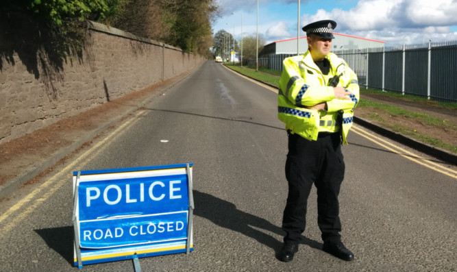 Police closed off a section of Liff Road and access to Whittle Place after an ammonia leak from Dundee Cold Stores Ltd.