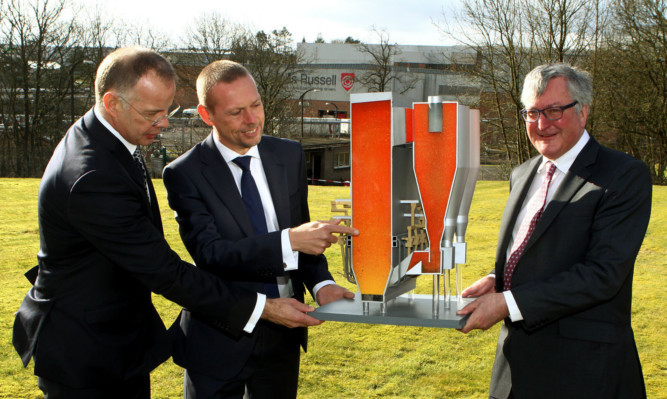 Energy Minister Fergus Ewing (right) at the official opening of the biomass plant last month with Tullis Russell Group chief executive Chris Parr and RWE Innogy chief operating officer Paul Coffey.