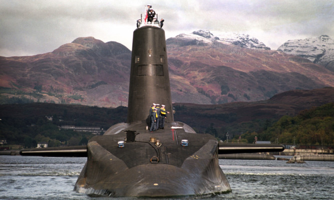 Michael Fallon questioned Labour's ability to renew Trident if they party is elected as a minority government.