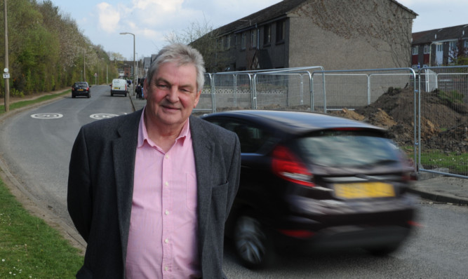 Councillor Brian Gordon at the junction.