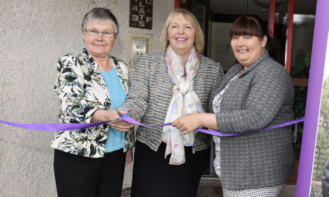 Gowrie Care Ltd chairwoman Janet Lynch, Councillor Glennis Middleton and Gowrie Care area manager Chris Robb at the ribbon cutting.