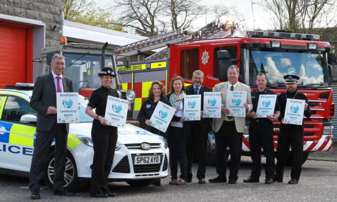 At the launch of the scheme are, from left, Councillor Michael Williamson; Sergeant Amanda Nicolson; Cordelia Menmuir, Sepa; Kate Maitland, National Farmers Union; Roddy Ross, Safer Communities PKC; Councillor Douglas Pover; Ewan Baird, Scottish Fire and Rescue Service, and Chief Inspector Mike Whitford.