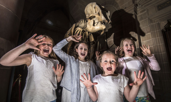 Evie Mason, Grace Robertson, Holly Mason and Niamh McLennan Cooke at the programme launch for the Festival of Museums at Edinburgh Universitys Anatomical Museum.
