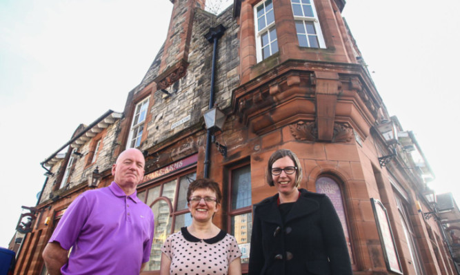 Mr Adam, Mrs Hamilton and housing officer Joanne Saurin.