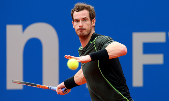Andy Murray claimed his first clay-court title in Munich.