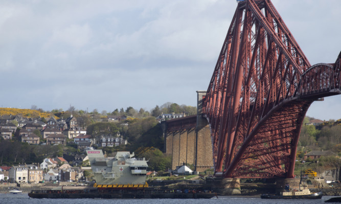 The 680-tonne Forward Island of HMS Prince of Wales has been delivered by barge to Rosyth Dockyard for assembly.
