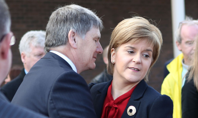 A slightly awkward embrace between Peter Grant, the SNP candidate for Glenrothes and Central Fife, and Nicola Sturgeon.
