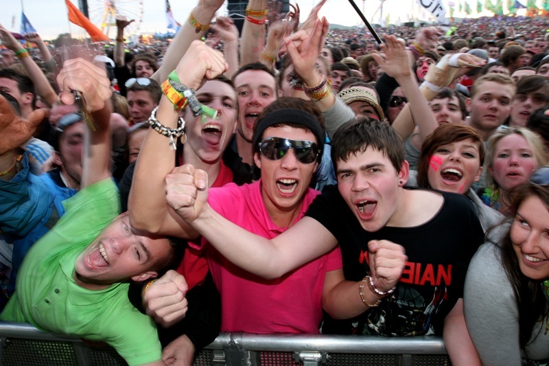 Steve MacDougall, Courier, Balado, Kinross. T in the Park 2010. Scenes from the event. Main Stage, during performance by 'Kasabian'. Pictured, centre in pink is Robbie Morris and right (with black T-shirt)  is Sean Briggs, both from Inverkeithing.