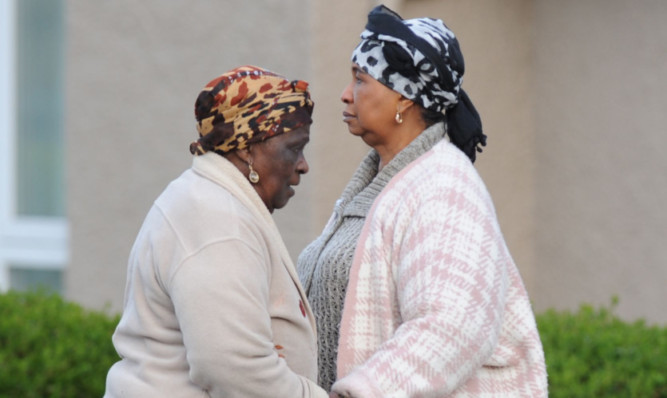 Sheku Bayoh's mother, right, was joined by friends and family at a gathering in Kirkcaldy on Wednesday night.