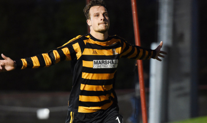 Alloa's Kyle Benedictus wheels away in celebration having put his side 2-0 up at Brechin.