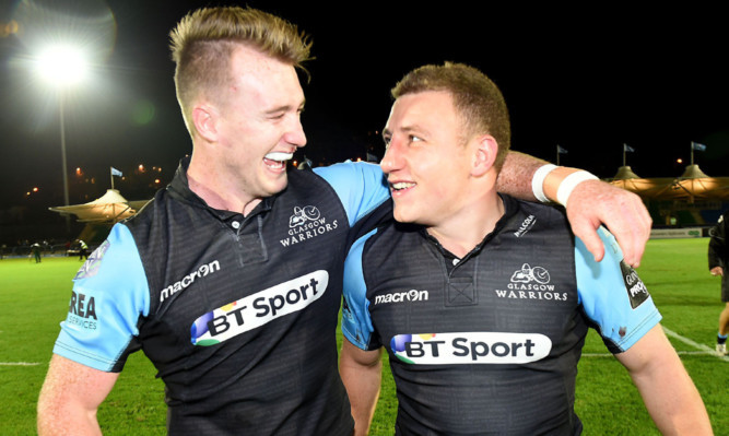 Stuart Hogg (left) and Duncan Weir are reunited for Glasgow at Ospreys tonight.
