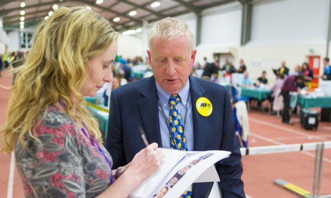 Courier reporter Cheryl Peebles interviews SNP candidate Douglas Chapman.