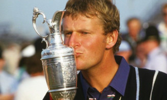 Sandy Lyle kisses the Claret Jug after winning the Open in 1985.