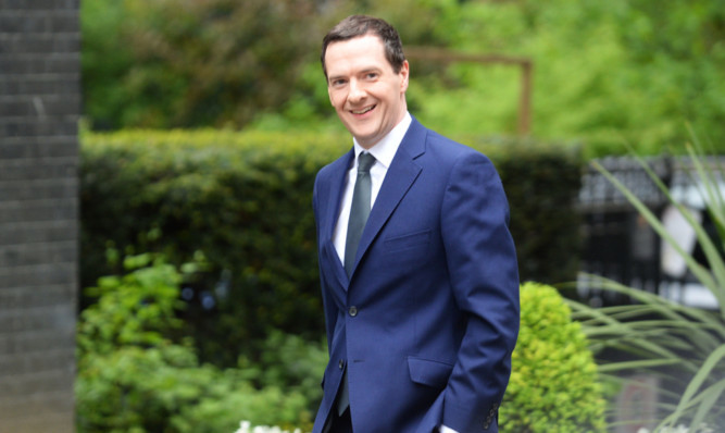 George Osborne arrives at 10 Downing Street following the Conservative's victory in the General Election.