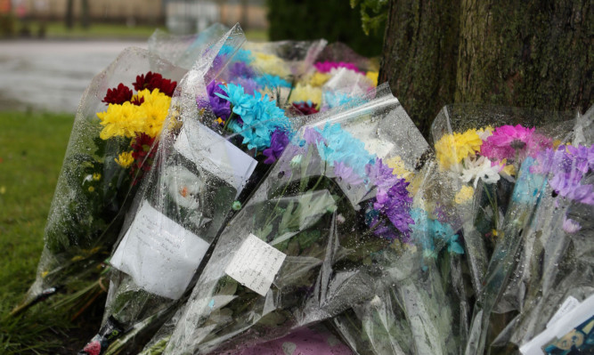 Floral tributes left near where Mr Bayoh was detained.