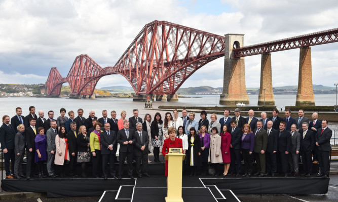 Nicola Sturgeon with her 56 SNP MPs at a photocall on Saturday morning.